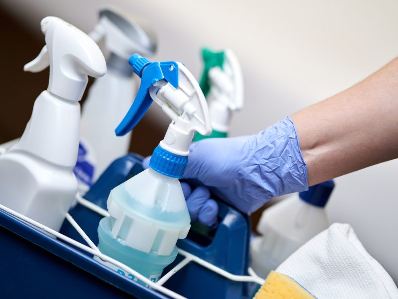 Set of cleaning supplies for hotel room cleaning